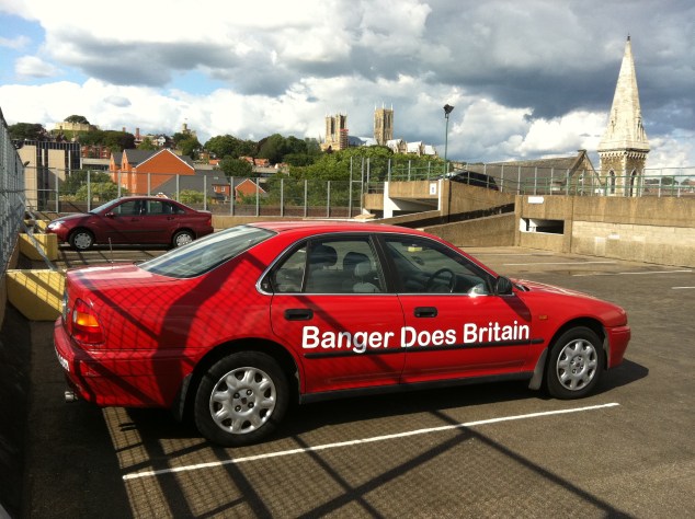 The Red Rocket admires the sights of Lincoln from the top floor of the Lucy Tower multi-storey