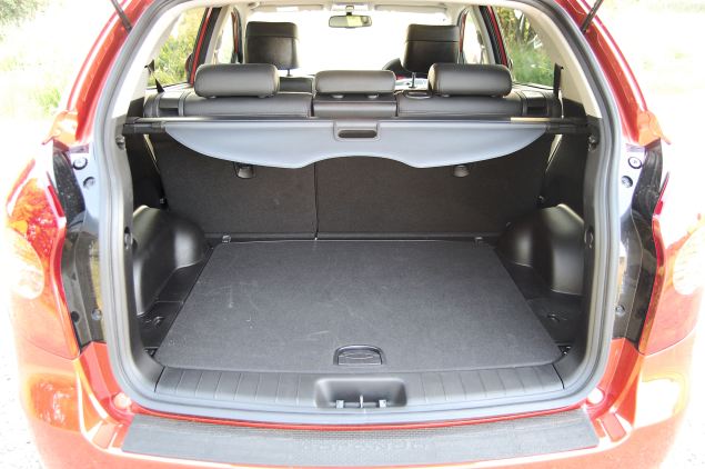 Spacious boot but high lip and a lot of uncarpeted surfacing in the Korando's boot.