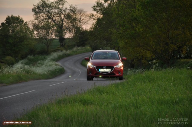 All-new 2015 Mazda2 1.5 90PS SE-L Nav full road test review evaluation report, freelance motoring blogger automotive journalist Oliver Hammond, wallpaper gallery photo - front action