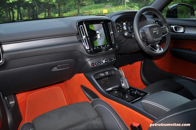 Volvo XC40 D4 R-Design AWD review by Oliver Hammond photo - interior Lava Orange red carpets seats upholstery